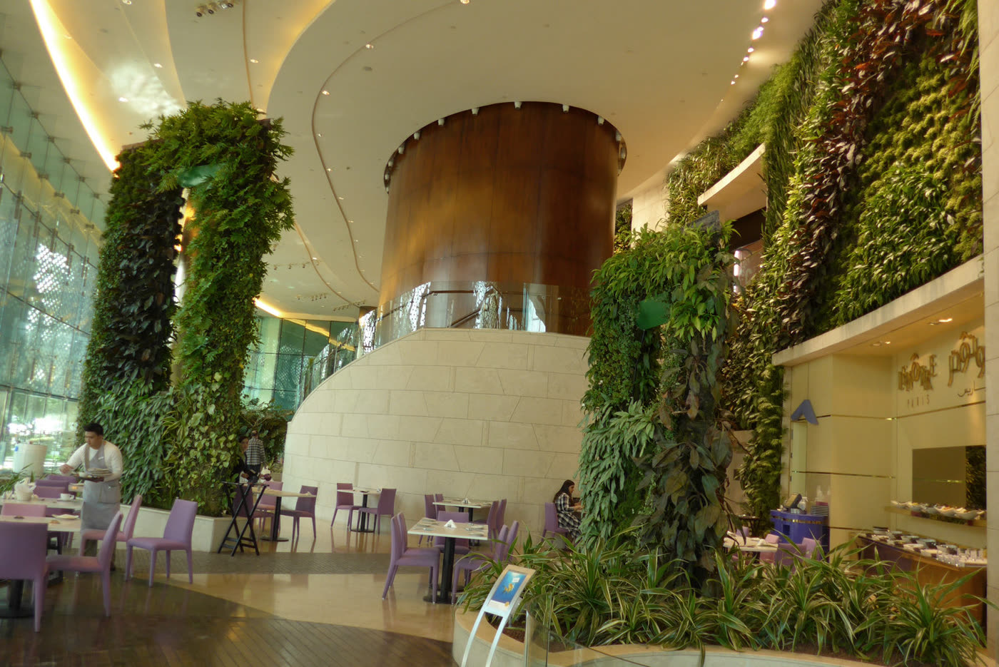 Towering indoor greenwalls in a commercial atrium