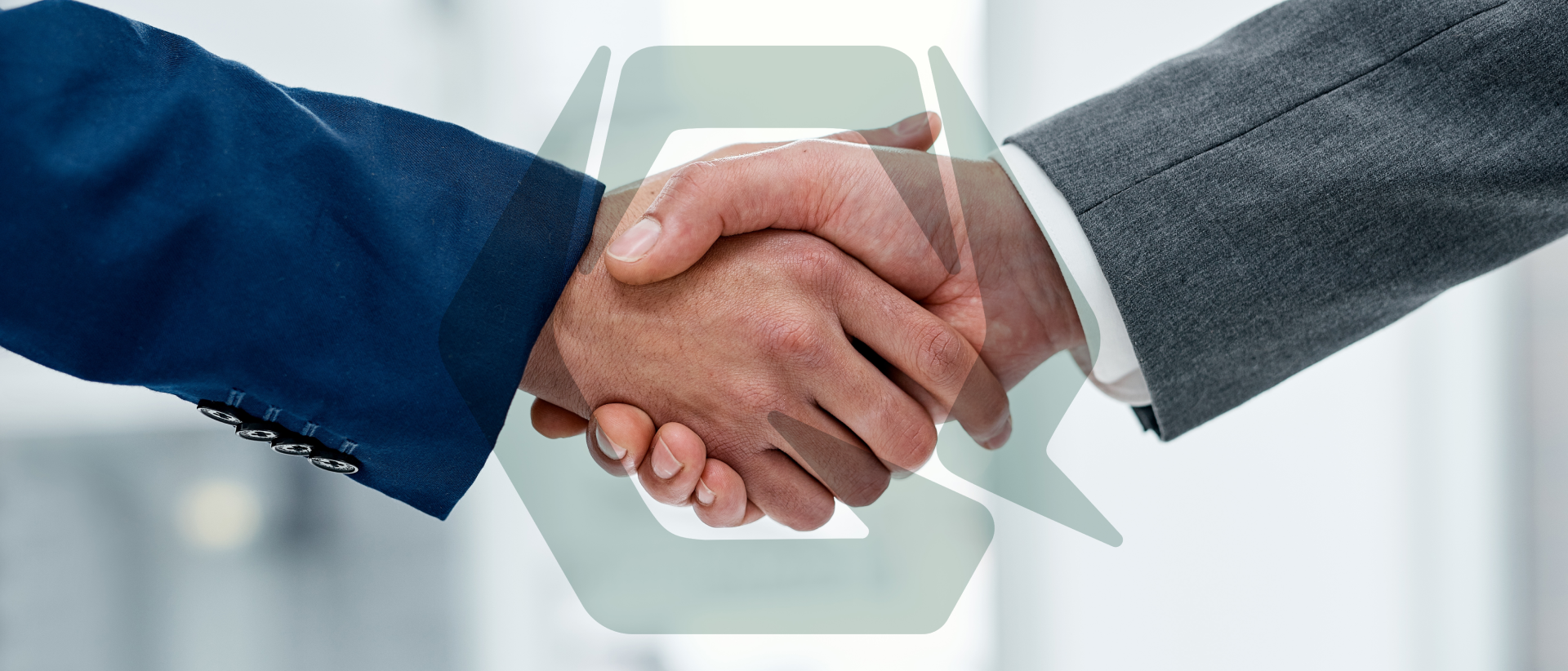 Business partnership handshake