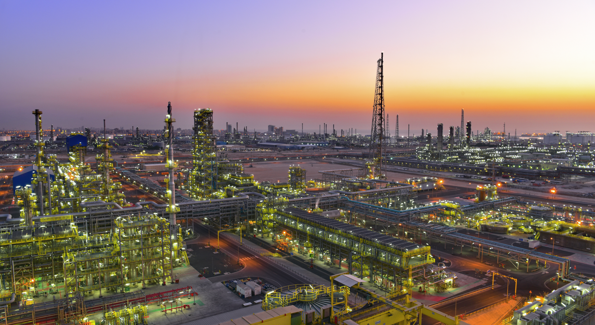 Modern Mina Al-Ahmadi oil refinery in Kuwait at dusk