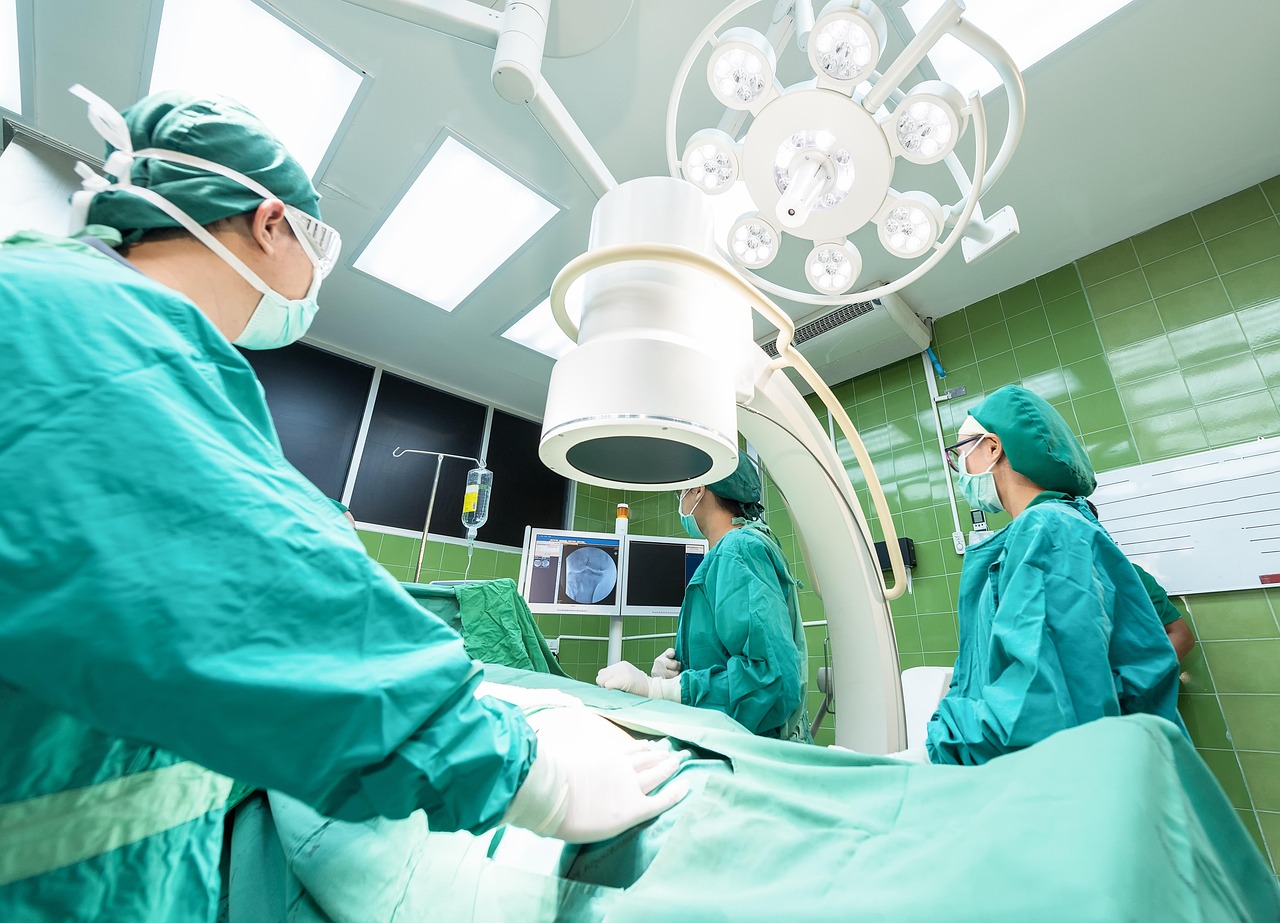 Surgical team working with advanced medical equipment
